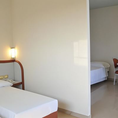 Deluxe Triple Room with Balcony and City View