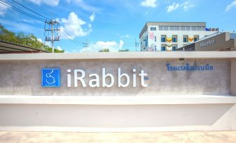 "a large sign with the word "" rabbit "" written on it , located in front of a building" at IRabbit Hotel