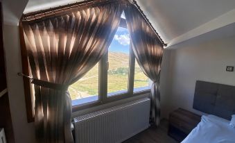 Zümrüt Palas Otel - Housity
