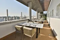 皇家曼蘇拉公寓酒店
