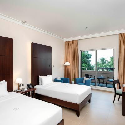 Deluxe Twin Room Pool View Millennium Central Mafraq Hotel Promo Code