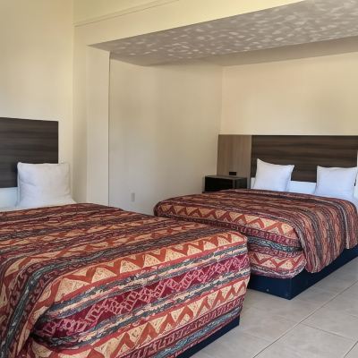 2 Queen Beds Room Captain's Table Hotel Promo Code