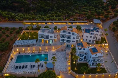 Quattro Suites Отели в г. 