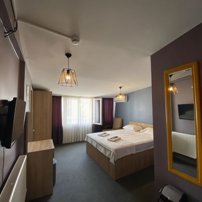 Standard Triple Room Retro Suites Promo Code