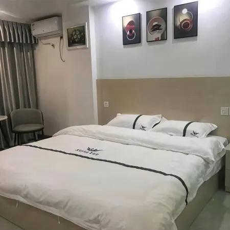 Luhe Xiangyue Apartment Отели в г. Лухэ