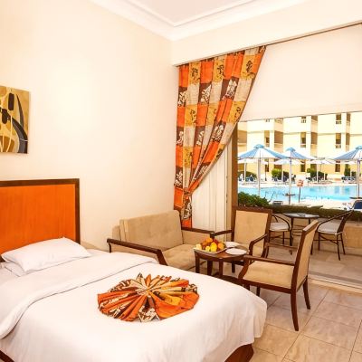 Standard Triple Room With Pool View AMC Royal Hotel & Spa Promo Code