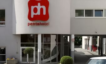 "the exterior of a hotel with a red sign that reads "" penta hotel "" in white letters" at Pentahotel Wiesbaden