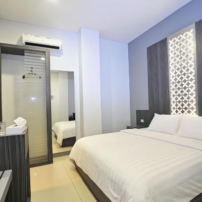 Deluxe Double Room Studio Inn & Suites Promo Code