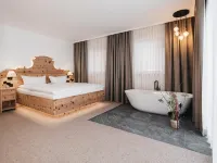 Almwellness-Resort Tuffbad Hotel di 