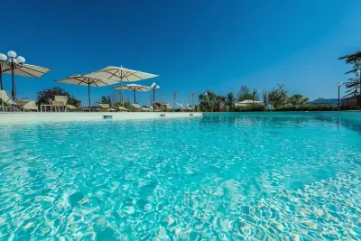Relais Paradiso Resort & Spa Отели в г. 