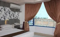 Grand Hotel Jambi فنادق في 