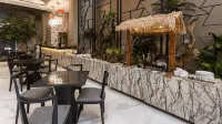 De Lobby Suite Hotel