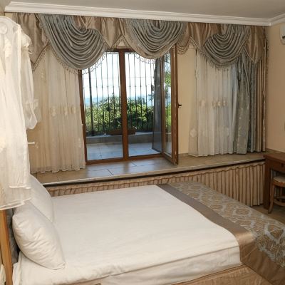 Economy Double Room and Garden Basement Floor SeaHouse Suites Promo Code