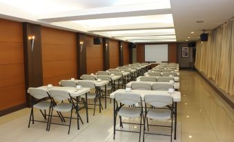 a conference room with rows of chairs arranged in a semicircle , ready for a meeting at Mount Sea Resort Hotel and Restaurant Cavite