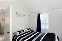 Okiwi Bay Cosy Cottage โรงแรมใน