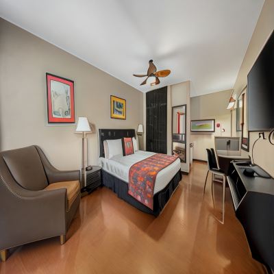 Deluxe King Room Caliente Tropics Promo Code