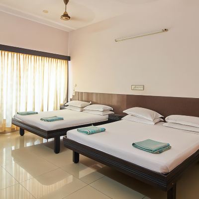 Four Bed Non AC Triveni Tourist Home Promo Code