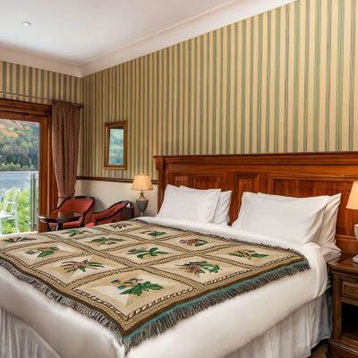 Country Lodge room The Whispering Pine Lodge Promo Code