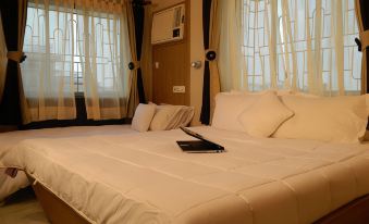 The Kei Inn & Suites Hotel