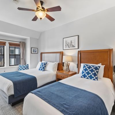 Room with One Queen Bed and One Single Bed and Shared Bathroom College Inn Hotel Promo Code