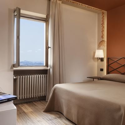 Superior Double or Twin Room Titano Suites Promo Code
