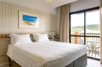Estúdios Modernos em Resort pé na Areia - Jurerê Beach Village Jbvjr