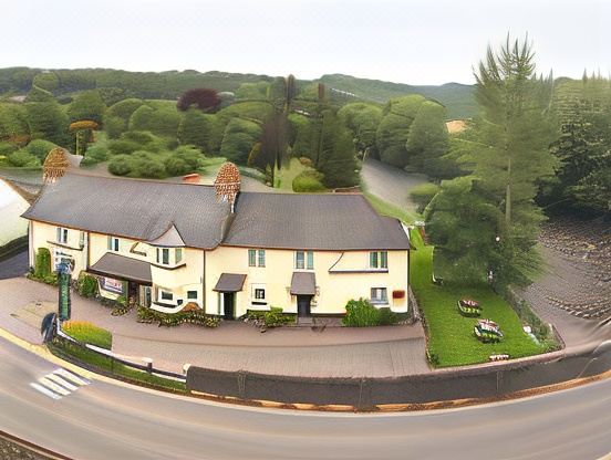a panoramic view of a large house surrounded by trees and grass , with a road in the foreground at The Anchor Inn