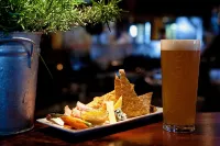 Spinnakers Brewpub & Guesthouses