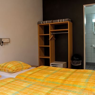 Quadruple Room With Shared Bathroom (Private WC) Geneva Hostel Promo Code