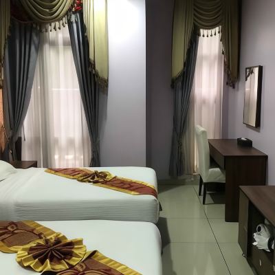 Bilik Twin Eksekutif Tidak Merokok Kupon AB Inn Hotel