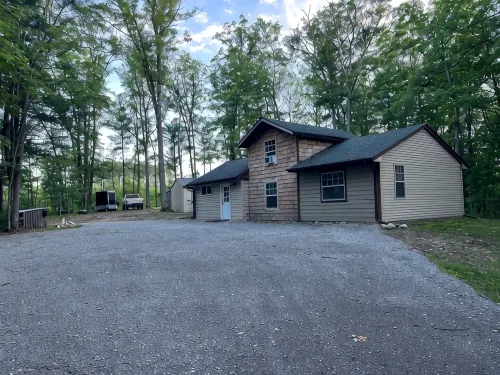 Cabin in the Woods, 10 Acres, Sleeps 8. Close to Orv Trails and Forest Dunes.