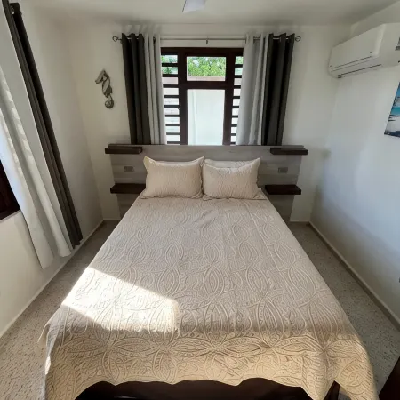 Charming 3-bedroom house with WiFi, AC in welcoming Rincón P.R.