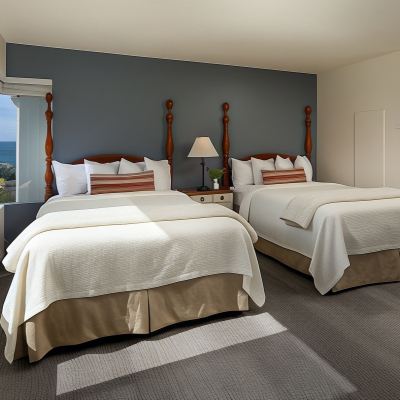 Room with Two Queen Beds and Partial Ocean View