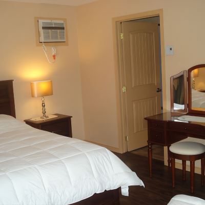 Standard Room With One Queen Bed And One Single Bed