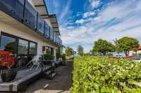 Le Chalet Suisse Motel Taupo Отели в г. 