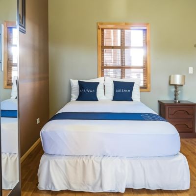 Economy Quadruple Room Capital O Hotel Villa Azura Promo Code