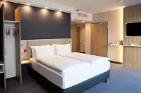 Holiday Inn Express LUSTENAU by IHG Отели в г. 