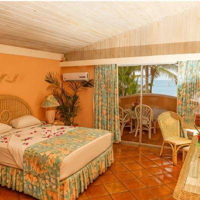 Deluxe One-Bedroom Suite with Ocean View Coco Reef Resort and Spa Promo Code