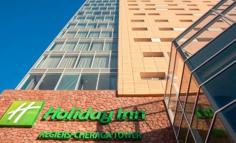 "a modern building with a sign that reads "" holiday inn "" and the word "" beisierschengleiten "" on it" at Holiday Inn Algiers - Cheraga Tower