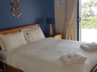 Roaring Beach Retreat - pet friendly, beachfront Ξενοδοχεία στην πόλη Geeveston
