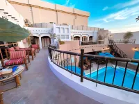 Al Liwan Suites
