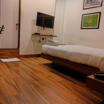 Executive Dark Room Sky Suites by Monarch Promo Code