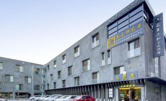 Qingdao Tuker Apartment Hotel