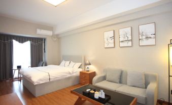 Q+ Junuo Apartment Hotel (Foshan Sanshui Wanda Plaza)