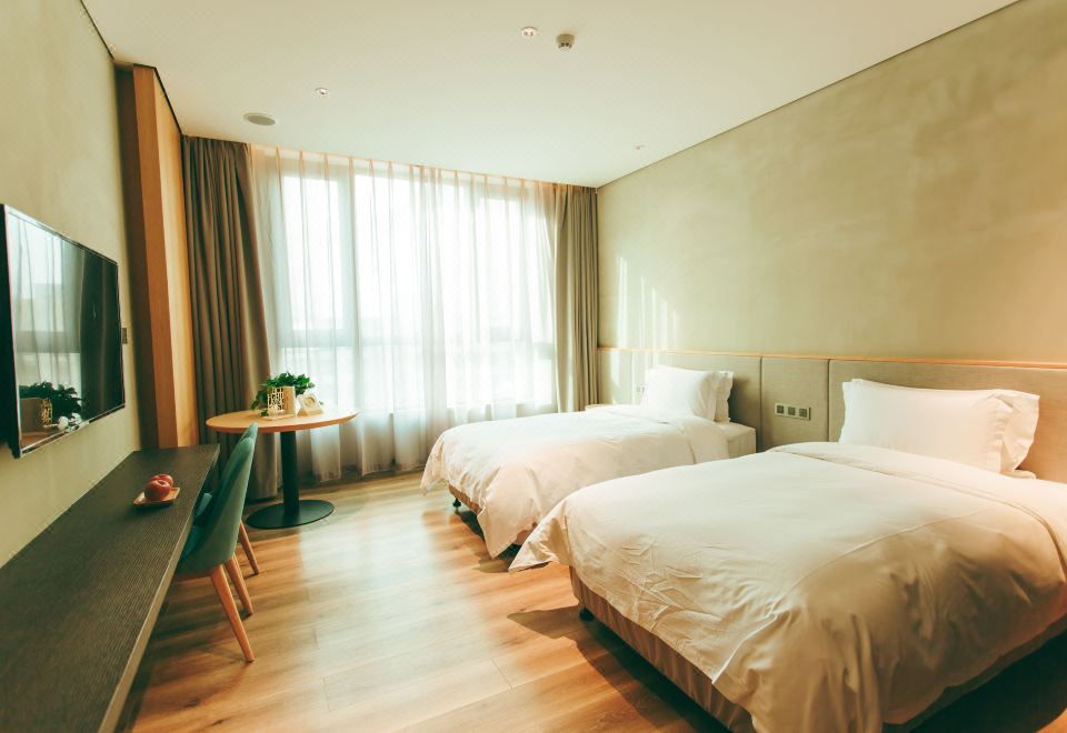 精緻雙床房（金可兒護脊床墊+乾濕三分離區+康乃馨星級布草）