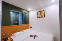 Daqing Boger Hotel (Xinmate Store)