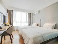 Nianbai Yulan Hotel (Feidong Platinum Center Baogong Avenue)