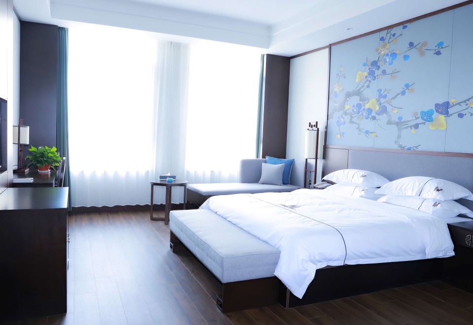 Wanbo Holiday HotelQueen Room