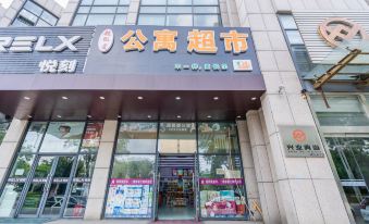 Super Ai Apartment (Qingdao Chengyang Railway Station Zhengyang Middle Road Subway Station Branch)