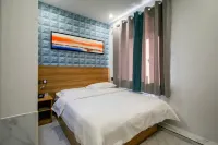 Daqing Boger Hotel (Xinmate Store)